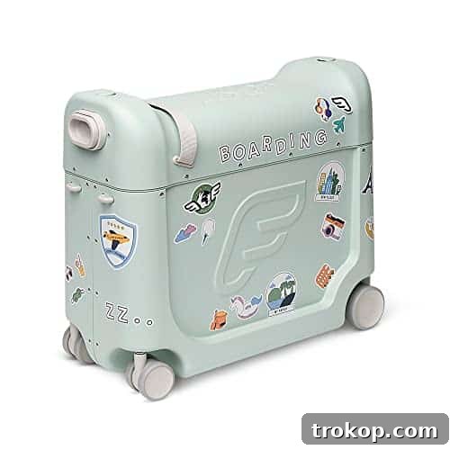 Make Travel a Breeze: 21 Top Kids' Luggage, From Carry-Ons to Ride-Ons 7 JetKids by Stokke BedBox, Green Aurora - Kid's Ride-On Suitcase & In-Flight Bed - Help Your Child Relax & Sleep on the Plane - Approved by Many Airlines - Best for Ages 3-7