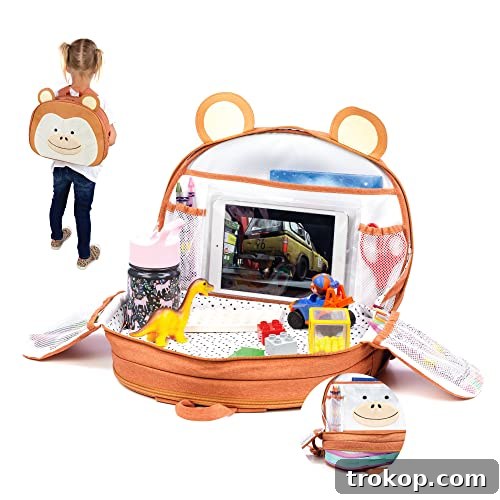 Make Travel a Breeze: 21 Top Kids' Luggage, From Carry-Ons to Ride-Ons 9 Lulyboo Toddler Car/Airplane Travel Activity Tray and Backpack with Firm Writing Surface, Built In Cup Holder and 7 Storage Pockets with Tablet Window, Monkey