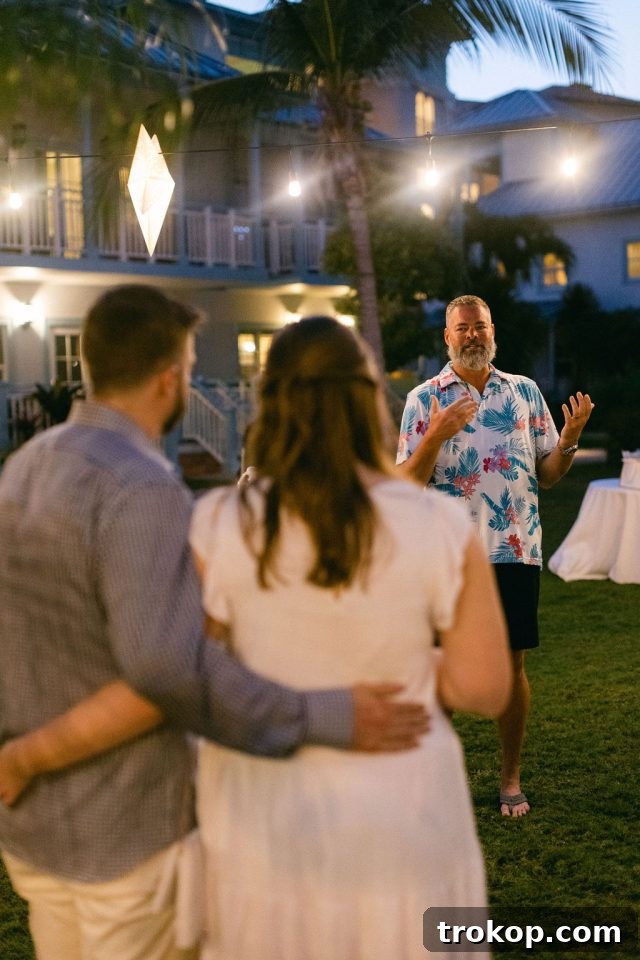 Beaches Turks and Caicos Sunset Vows by the Sea 14 Father of the bride giving a heartfelt welcome speech at the cocktail party