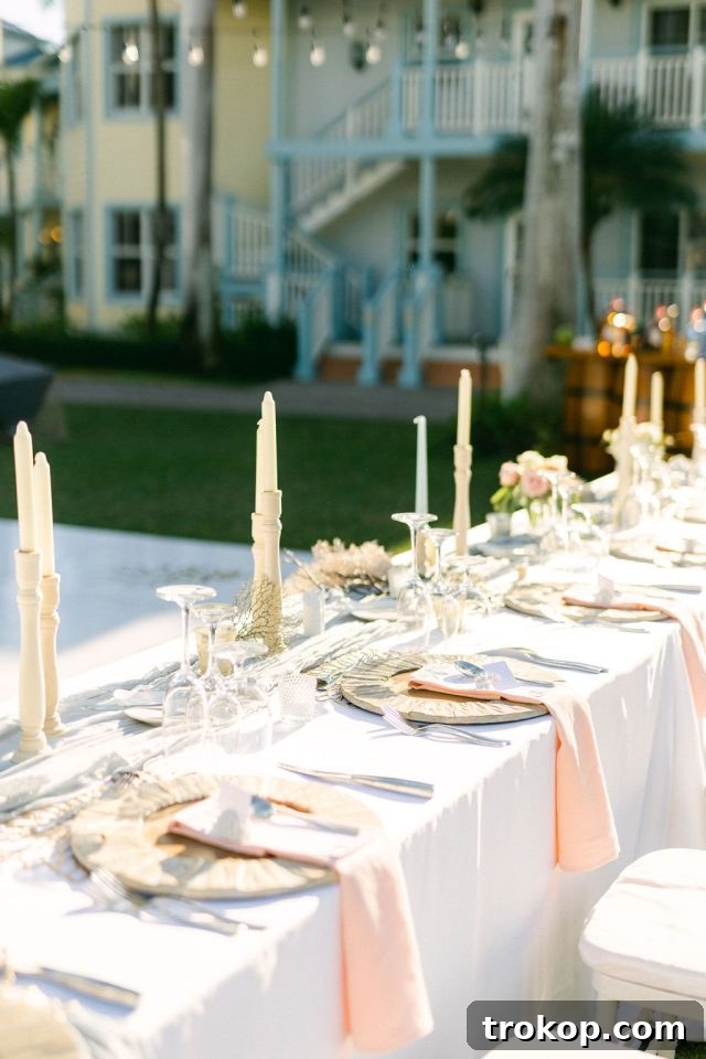 Beaches Turks and Caicos Sunset Vows by the Sea 23 Close-up of a beautifully arranged floral centerpiece and wedding decor