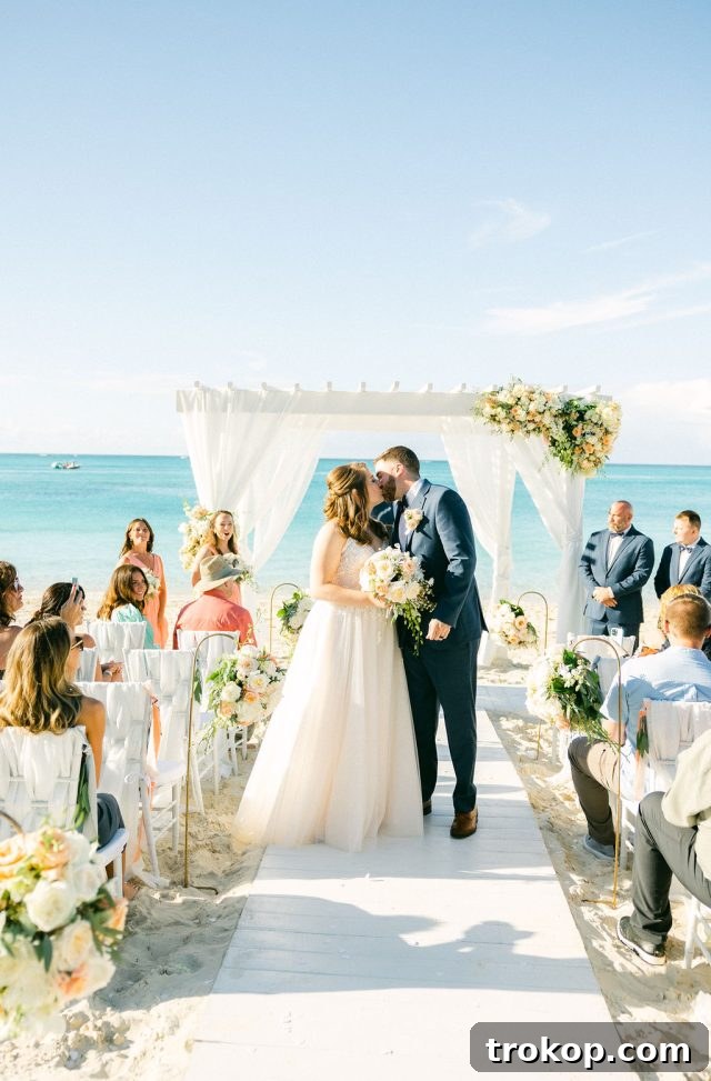 Beaches Turks and Caicos Sunset Vows by the Sea 34 The beautiful bride walking down the aisle towards her groom, a vision in white