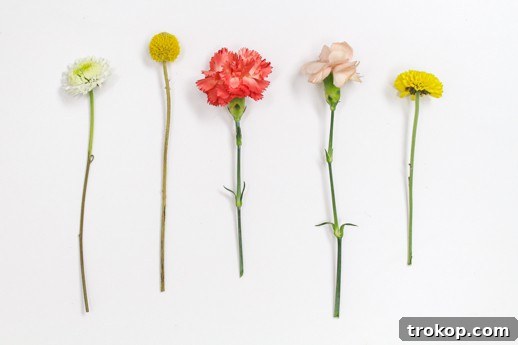 Woman wearing a beautiful DIY floral headpiece with lush flowers and delicate foliage