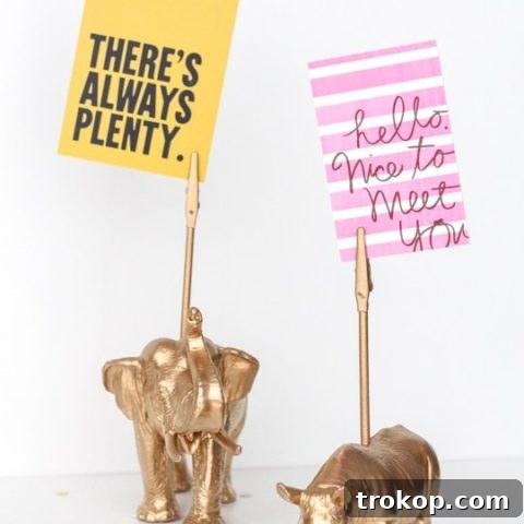 Finished golden elephant DIY memo holder, ready for use as a desktop gift.