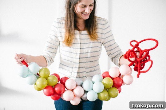 Finished color block ornament garland adding festive cheer to a home