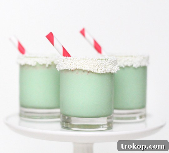 A tray of finished Christmas cookie ice cream shots ready to be served at a party.