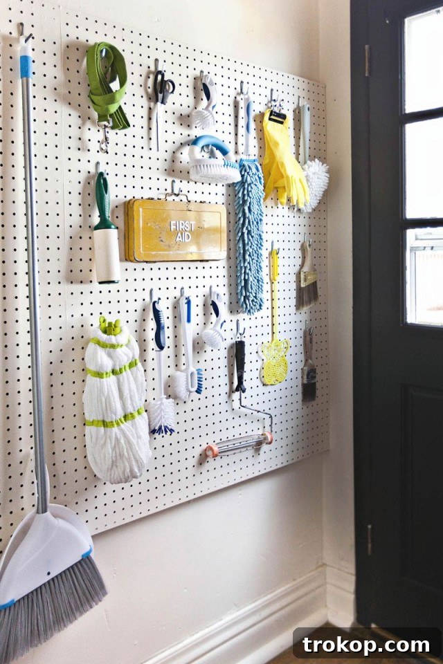 Pegboard Perfection: 26 Creative Ways to Organize and Beautify Every Room 6 Pegboard Ideas for organizing cleaning supplies in a laundry room or utility closet