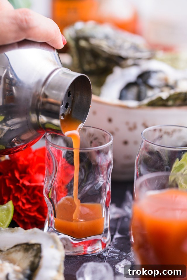 Oyster Shooter Recipe
A Zesty Oyster Shooter to Kickstart Your Palate 6 Pouring Chilled Vodka Mix into Shot Glasses