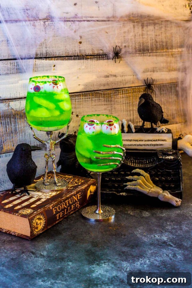 Potions & Poisons: Halloween's Sinister Sips 17 Grave Digger Halloween Cocktails with edible glitter