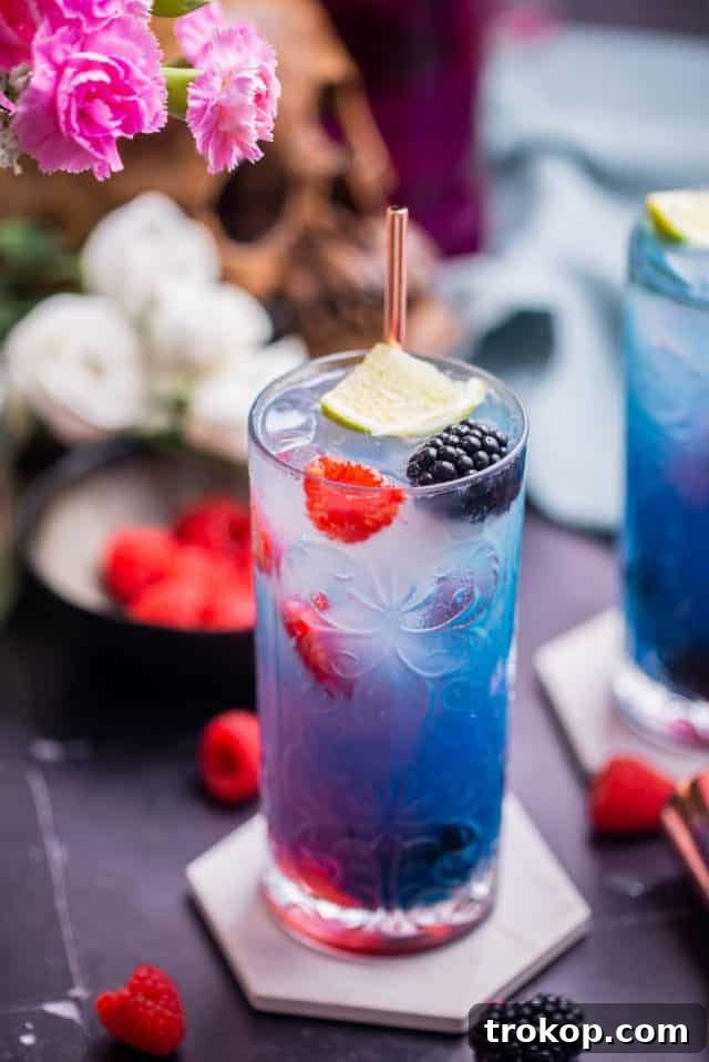 Terrifying Tipples for a Spooktacular Halloween 7 colorful cocktail drink with lemon garnish - Grateful dead cocktail recipe