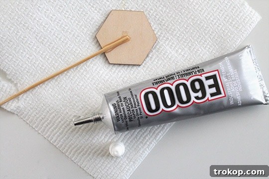 Materials and tools for making DIY Gold Fringe Drink Toppers.