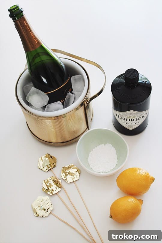 French 75 cocktails served in elegant glasses with lemon twists.