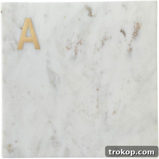 The Art of Appreciation: 37 Perfect Thank You Gifts 7 Monogram Marble Cheese Board, a stylish and personalized thank you gift for entertaining.