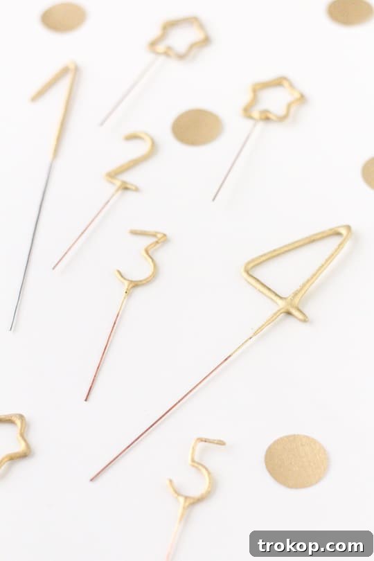 DIY Countdown Cupcakes - Individual cupcakes with numbered sparklers, ready to be lit.