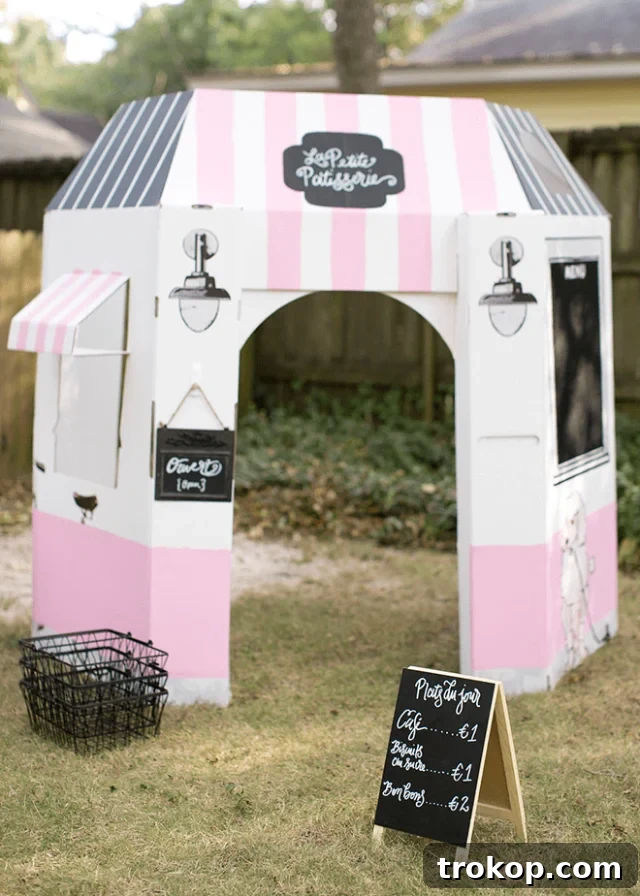 Paris Play Party for kids with cardboard cutouts and cookie decorating