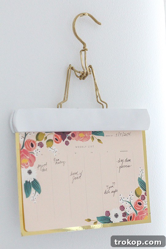 Close-up of a beautiful DIY metallic calendar wall hang, adding a chic and personalized touch to any room