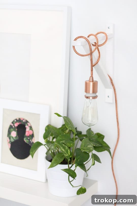 DIY: Metallic Pendant Sconce - Finished product illuminating a space.