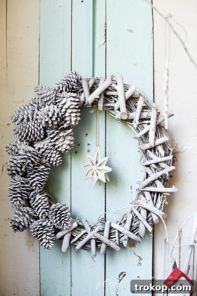 27 Handmade Christmas Wreaths for a Festive Home 13 Rustic DIY Nature Christmas Wreath made from backyard twigs and pinecones