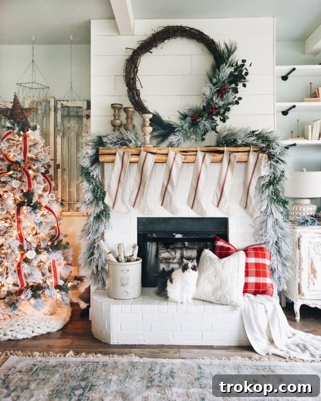 27 Handmade Christmas Wreaths for a Festive Home 16 Charming Farmhouse Christmas Wreath with evergreen and berries