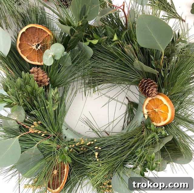 27 Handmade Christmas Wreaths for a Festive Home 21 Fragrant DIY Dried Flowers & Fruit Wreath for a natural Christmas scent