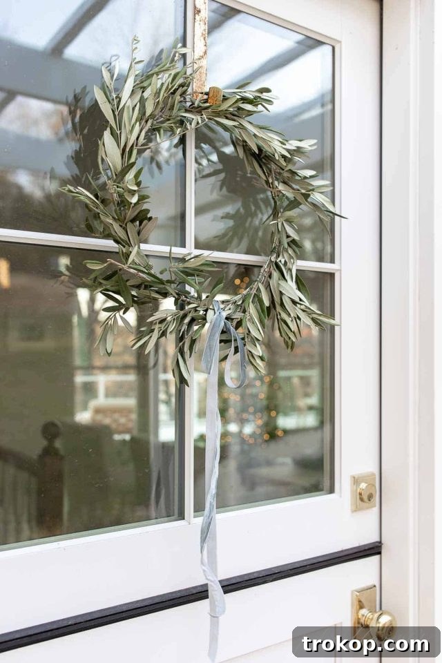 27 Handmade Christmas Wreaths for a Festive Home 6 Rustic DIY Branches Wreath for a natural Christmas look