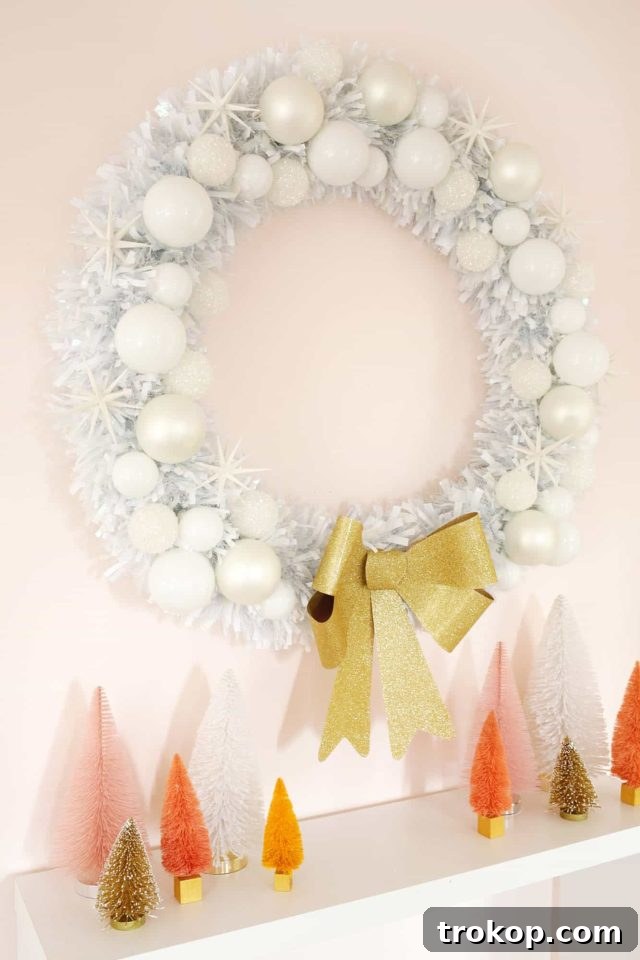 27 Handmade Christmas Wreaths for a Festive Home 8 Creative DIY Oversized Christmas Wreath made with Pool Noodles