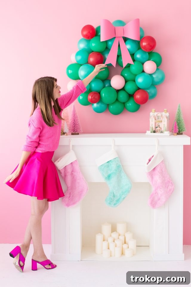 27 Handmade Christmas Wreaths for a Festive Home 9 Festive DIY Christmas Balloon Wreath for parties
