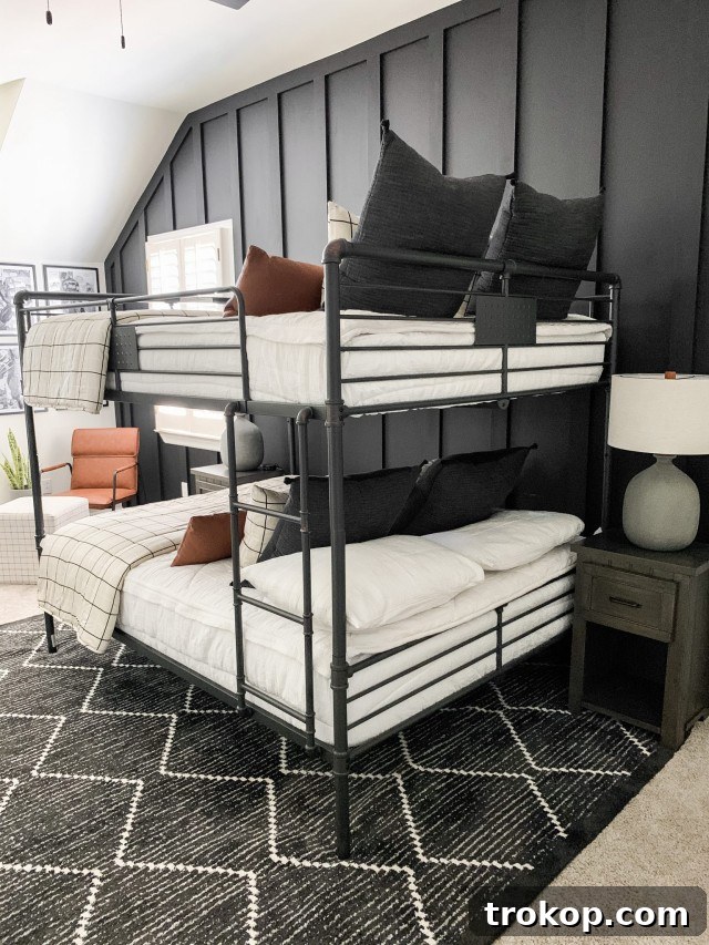 His Style, His Walls: Personalized Paint Ideas for Boys' Bedrooms 4 Black Battan Boys Bedroom Paint Idea