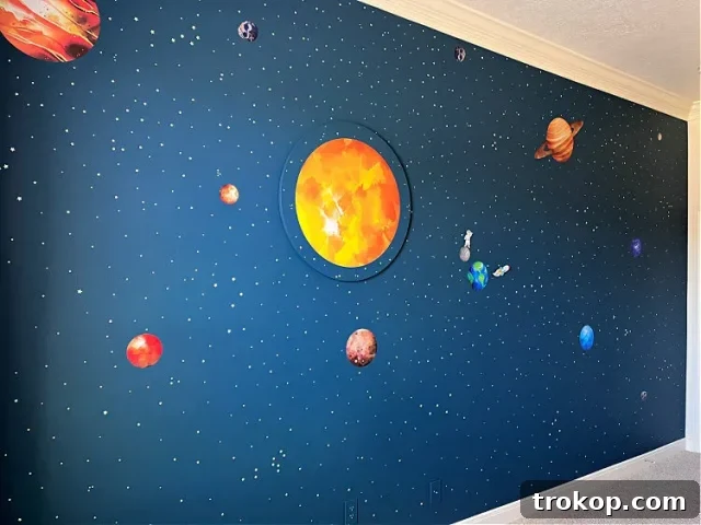 His Style, His Walls: Personalized Paint Ideas for Boys' Bedrooms 6 Outer space Bedroom Paint Idea