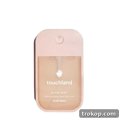Effortless Adventures: Essential Packing for Her 3 Touchland Glow Mist Rosewater Revitalizing Hand Sanitizer for best travel essentials for woman