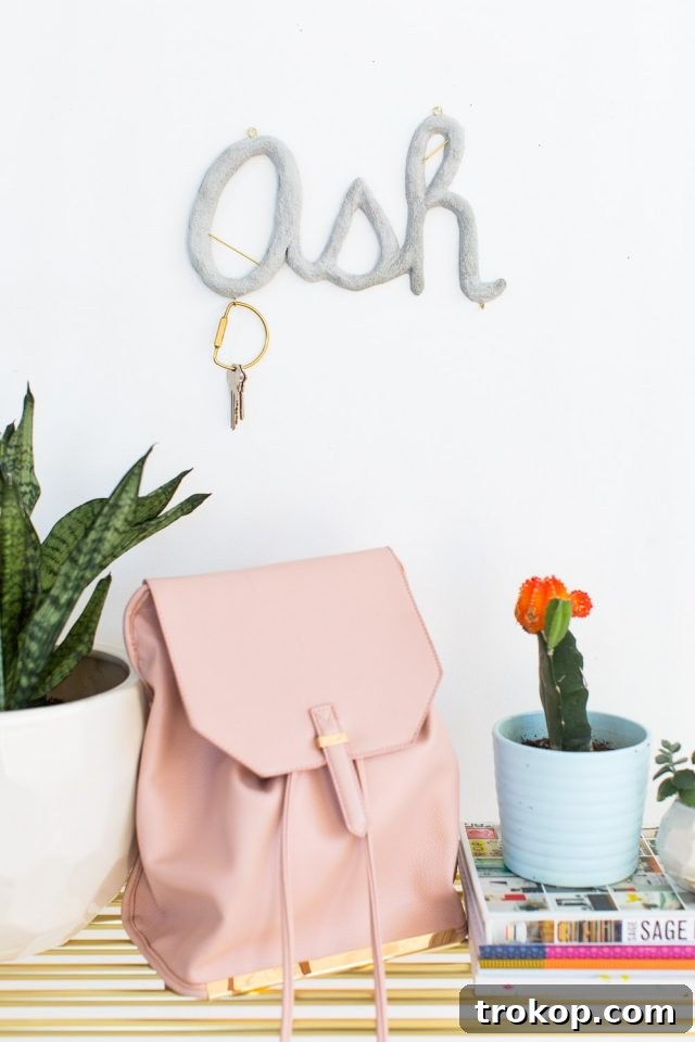Reclaim Your Entryway: 15 Smart Storage Ideas for a Clutter-Free Foyer 9 DIY hanging cement monogram - sugar and cloth - decor - keyring holder