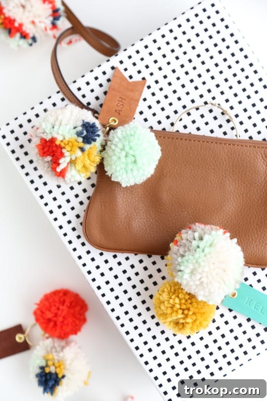 Playful Pom Pom Leather Bag Charms 2 DIY pom pom and leather luggage tag in vibrant colors