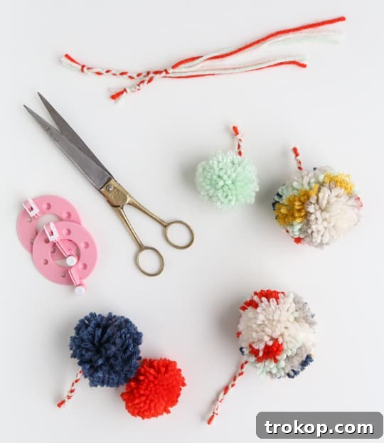 Playful Pom Pom Leather Bag Charms 4 Materials and tools laid out for DIY pom pom leather luggage tag project