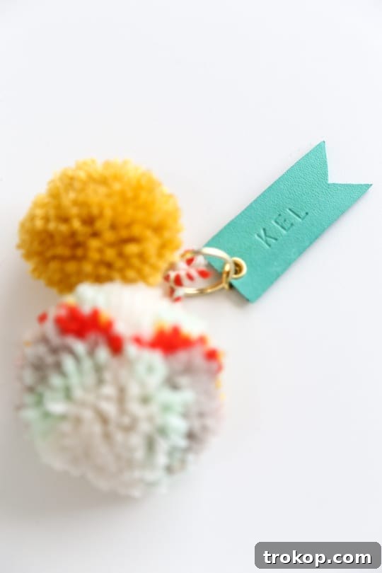Playful Pom Pom Leather Bag Charms 8 Assembling a DIY pom pom and leather luggage tag with keyring and jump ring