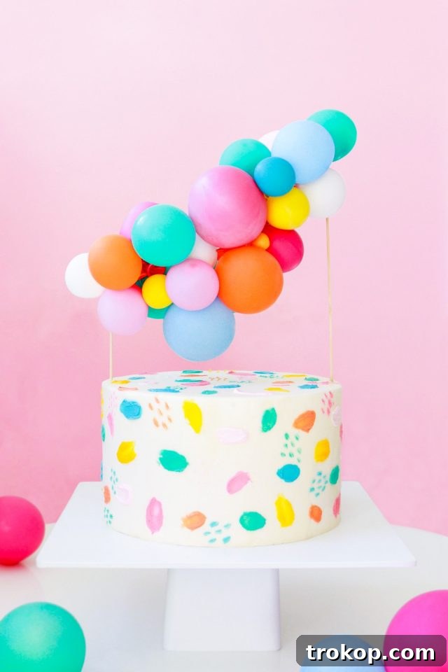 17 DIY Cake Toppers to Make Your Celebration Unforgettable 3 DIY Balloon Cake Topper by top Houston lifestyle Blogger Ashley Rose of Sugar & Cloth