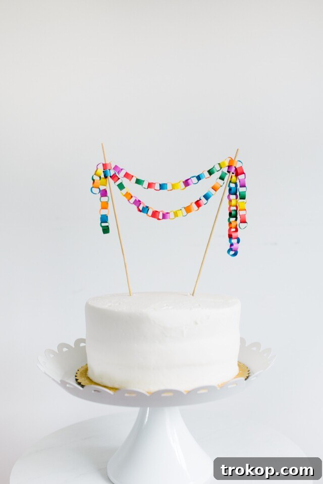 17 DIY Cake Toppers to Make Your Celebration Unforgettable 9 Mini DIY Paper Chain Cake Topper