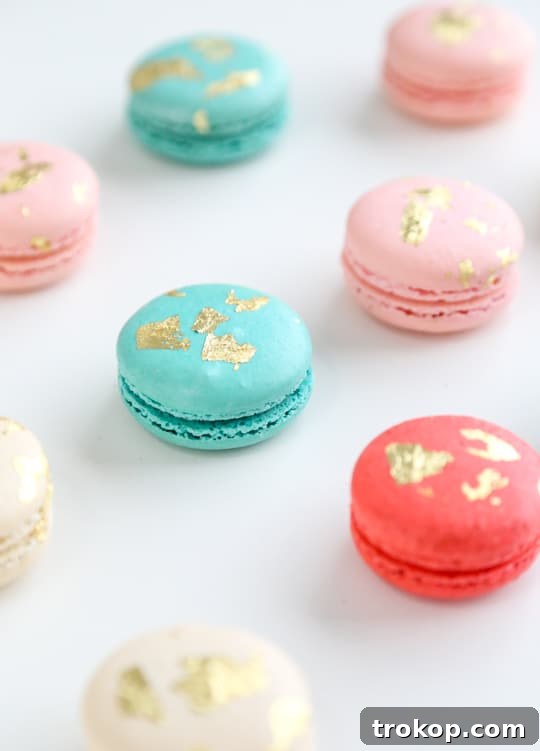 DIY edible gold leaf macarons, showcasing the easy application process