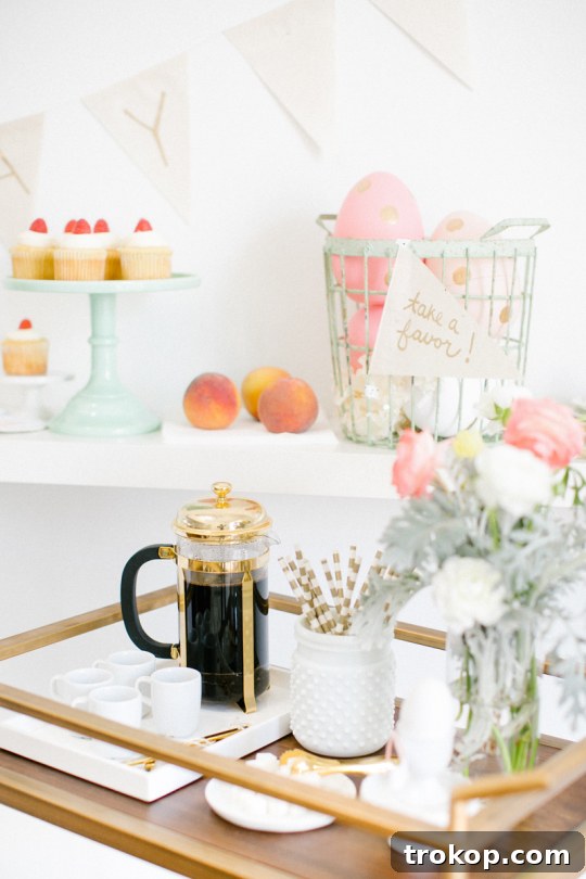 Bright Easter Sunday Dessert Table Inspiration 9 Creative display of dessert flags using egg cups and a mini cake stand