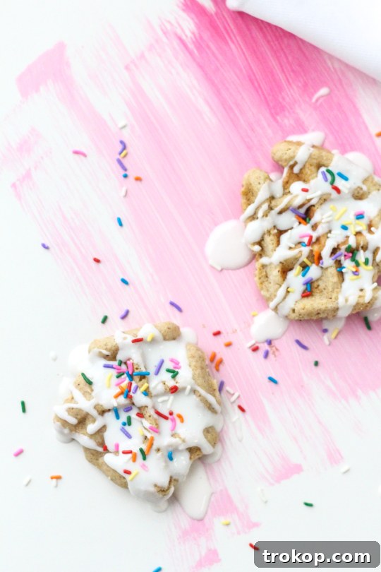 Finished Mini Waffle Cakes Drizzled with Icing and Sprinkles