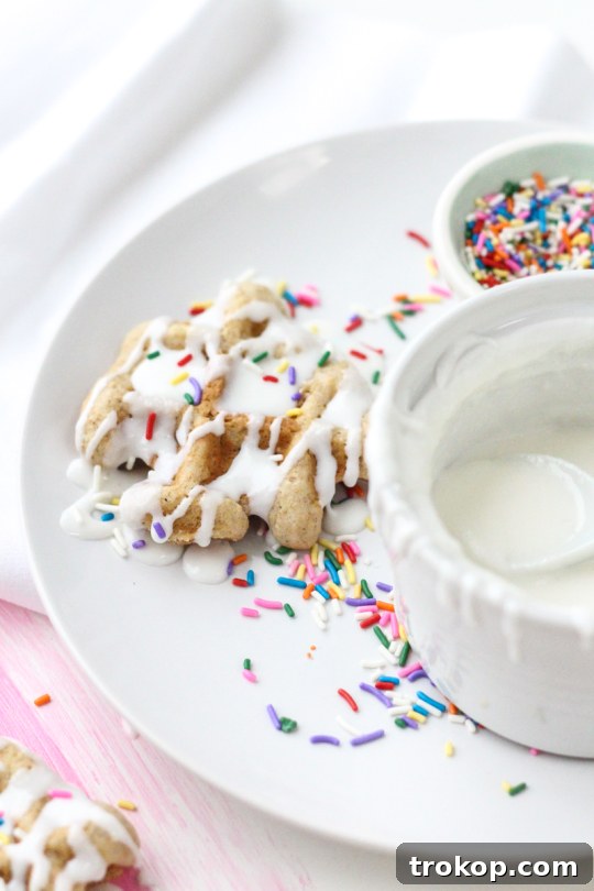 Variety of Mini Waffle Cakes with Different Toppings on a Platter